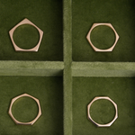 Ring Bands 18K yellow gold pentagon hexagon heptagon octagon wedding band on green velvet