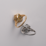 Sage Hex Ring showing it in both 18K yellow gold and in platinum on white background showing back details