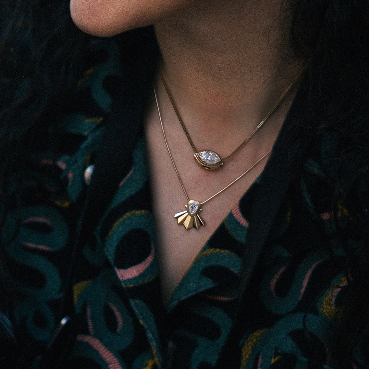 Siren shell pendant on a snake chain with snake shirt with Sage Marquise Pendant