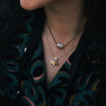 Siren shell pendant on a snake chain with snake shirt with Sage Marquise Pendant